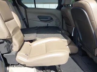 2014 Ford Transit Connect XLT with VIN NM0GS9F7XE1141576, listed as a IAAI auction lot 42458602 with 196,654 mi miles and . Bid and sale history available at DreamBid. Image 8.