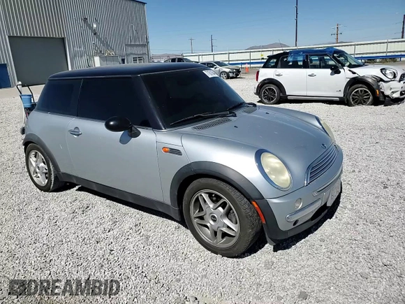 2002 MINI Hardtop with VIN WMWRC33472TC34281, listed as a Copart auction lot 71631644 with 196,947 mi miles and Salvage Title. Bid and sale history available at DreamBid. Image 11.