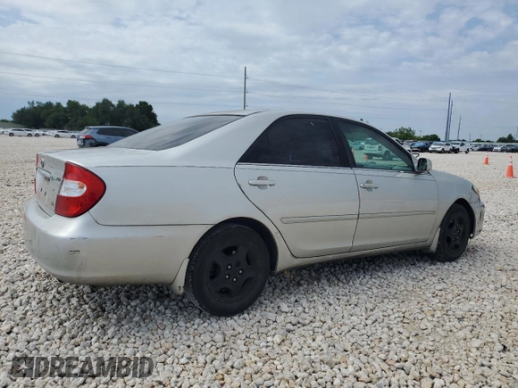 2002 Toyota Camry XLE z VIN 4T1BF32K12U519069, wystawiony jako Copart lot #55501405 z przebiegiem 186 142 mil mil oraz Szkoda całkowita • Salvage title. Historia ofert i sprzedaży dostępna na DreamBid. Obrazek 3.