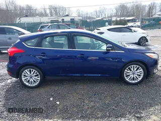 2017 Ford Focus Titanium with VIN 1FADP3N25HL272276, listed as a IAAI auction lot 41630327 with 110,899 mi miles and . Bid and sale history available at DreamBid. Image 13.