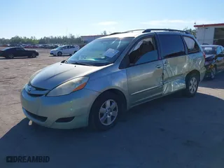 2010 Toyota Sienna CE with VIN 5TDKK4CC2AS329149, listed as a IAAI auction lot 41454554 with 202,599 mi miles. Bid and sale history available at carsss.com. Image 2.