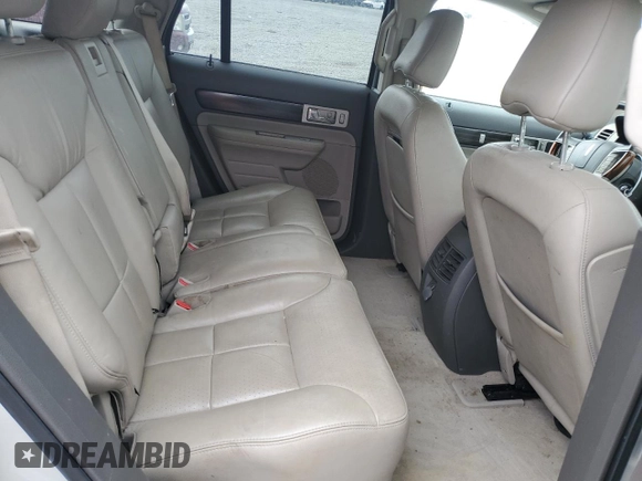 2007 Lincoln MKX z VIN 2LMDU68C97BJ33226, wystawiony jako Copart lot #52607515 z przebiegiem 195 123 mil mil oraz Szkoda całkowita • Salvage title. Historia ofert i sprzedaży dostępna na DreamBid. Obrazek 11.