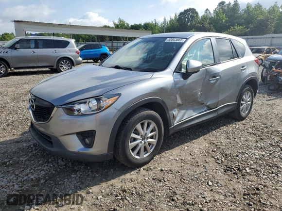 2014 Mazda CX-5 Touring z VIN JM3KE2CY0E0412733, wystawiony jako Copart lot #55803865 z przebiegiem 161 539 mil mil oraz Szkoda całkowita • Salvage title. Historia ofert i sprzedaży dostępna na DreamBid. Obrazek 1.