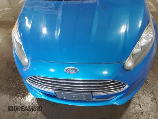 2015 Ford Fiesta SE z VIN 3FADP4BJ7FM140567, wystawiony jako Copart lot #57292015 z przebiegiem Nie podano mil oraz Czysty tytuł • Clean title. Historia ofert i sprzedaży dostępna na DreamBid. Obrazek 11.