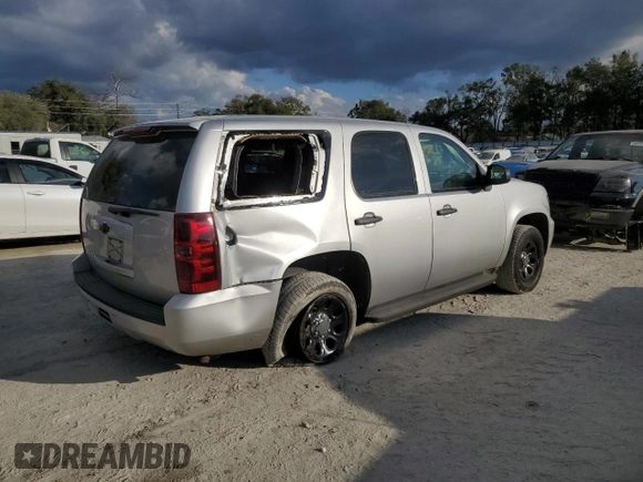 2011 Chevrolet Tahoe Commercial with VIN 1GNLC2E02BR306292, listed as a Copart auction lot 44136095 with 172,104 mi miles and Salvage title. Bid and sale history available at DreamBid. Image 3.