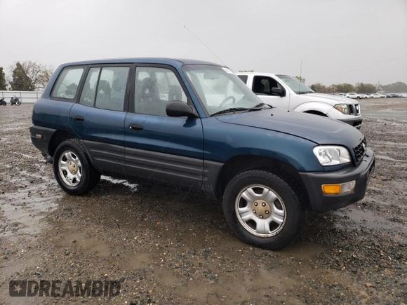 1999 Toyota RAV4 with VIN JT3GP10V6X0036057, listed as a Copart auction lot 49011295 with 183,287 mi miles and Clean title. Bid and sale history available at DreamBid. Image 4.