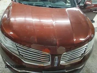 2016 Lincoln MKX Reserve z VIN 2LMPJ8LP3GBL29092, wystawiony jako Copart lot #84923904 z przebiegiem 94 213 mil mil oraz Szkoda całkowita • Salvage title. Historia ofert i sprzedaży dostępna na DreamBid. Obrazek 12.