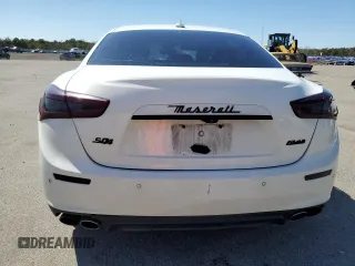 2017 Maserati Ghibli S Q4 z VIN ZAM57RTA6H1247079, wystawiony jako Copart lot #52099755 z przebiegiem 124 159 mil mil oraz Szkody całkowita. Historia ofert i sprzedaży dostępna na DreamBid. Obrazek 6.