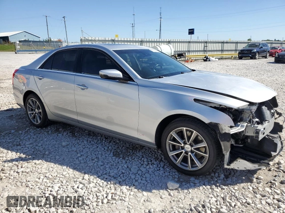 2018 Cadillac CTS Luxury RWD with VIN 1G6AR5SX0J0116627, listed as a Copart auction lot 73523634 with 118,202 mi miles and Non repairable. Bid and sale history available at DreamBid. Image 4.