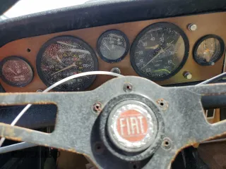1979 FIAT 124 Spider z VIN 124CS20144522, wystawiony jako Copart lot #77779724 z przebiegiem 651 mil mil oraz Szkoda całkowita • Salvage title. Historia ofert i sprzedaży dostępna na DreamBid. Obrazek 9.