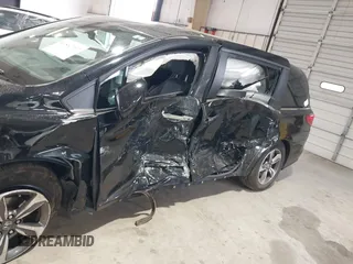 2018 Honda Odyssey Touring with VIN 5FNRL6H87JB105410, listed as a IAAI auction lot 41860707 with 91,908 mi miles. Bid and sale history available at carsss.com. Image 6.