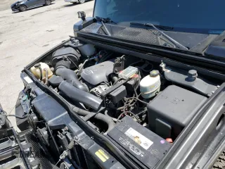 2005 Hummer H2 SUV z VIN 5GRGN23U05H117630, wystawiony jako Copart lot #57087305 z przebiegiem 60 260 mil mil oraz Szkoda całkowita • Salvage title. Historia ofert i sprzedaży dostępna na DreamBid. Obrazek 11.