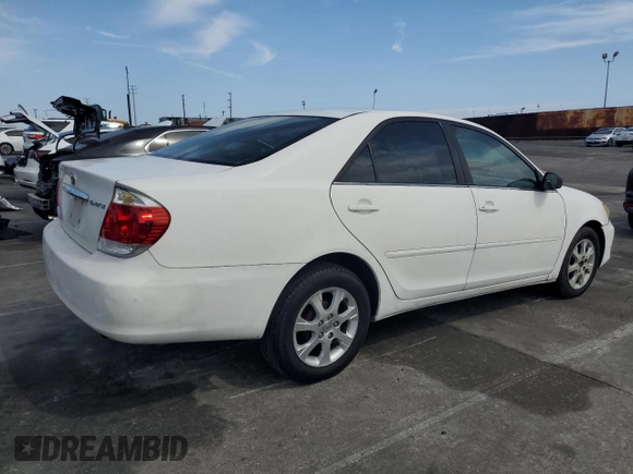 2004 Toyota Camry LE with VIN 4T1BE32KX4U379593, listed as a Copart auction lot 53391455 with 221,056 mi miles and Salvage Title. Bid and sale history available at carsss.com. Image 3.