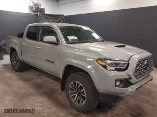 2023 Toyota Tacoma 4WD SR with VIN 3TMCZ5ANXPM607489, listed as a IAAI auction lot 41605018 with 15,229 mi miles. Bid and sale history available at carsss.com. Image 1.