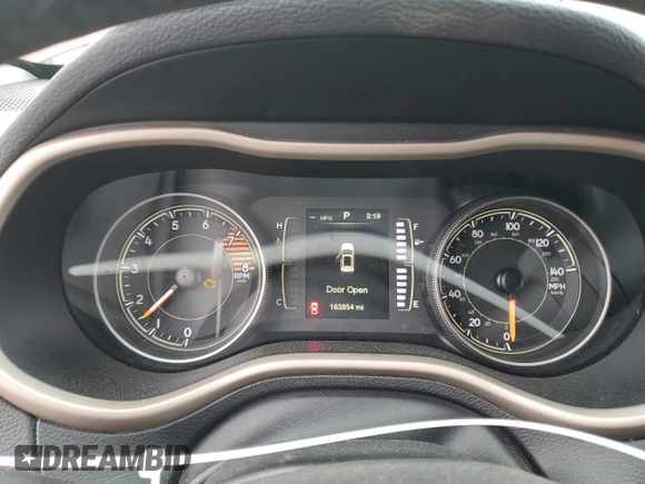 2016 Jeep Cherokee Sport z VIN 1C4PJLAS4GW329112, wystawiony jako Copart lot #89201565 z przebiegiem 163 854 mil mil oraz Szkoda całkowita • Salvage title. Historia ofert i sprzedaży dostępna na DreamBid. Obrazek 9.