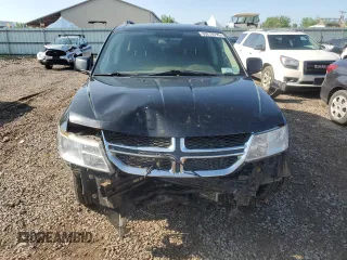 2017 Dodge Journey SXT with VIN 3C4PDDBG8HT525147, listed as a Copart auction lot 63270795 with 169,369 mi miles and Salvage title. Bid and sale history available at DreamBid. Image 5.