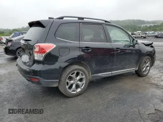 2017 Subaru Forester Touring with VIN JF2SJATC7HH437543, listed as a Copart auction lot 60866985 with 50,532 mi miles and Salvage title. Bid and sale history available at DreamBid. Image 3.