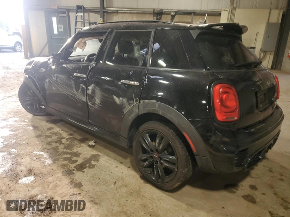 2015 MINI Hardtop 4 Door S with VIN WMWXU3C55F2B62019, listed as a Copart auction lot 46853535 with 124,919 mi miles and Salvage title. Bid and sale history available at DreamBid. Image 2.