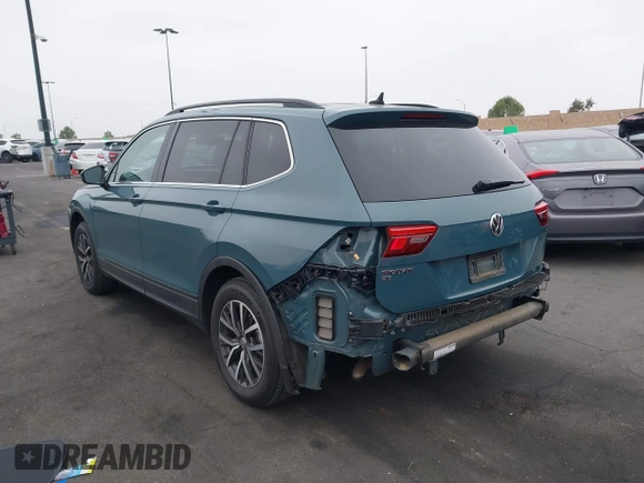 2019 Volkswagen Tiguan SE with VIN 3VV3B7AX3KM113955, listed as a IAAI auction lot 42164890 with 77,806 mi miles and . Bid and sale history available at DreamBid. Image 15.