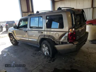 2006 Jeep Commander Limited z VIN 1J8HG58N86C305693, wystawiony jako Copart lot #80289634 z przebiegiem 158 711 mil mil oraz Szkoda całkowita • Salvage title. Historia ofert i sprzedaży dostępna na DreamBid. Obrazek 2.