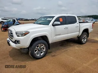 2018 Toyota Tacoma SR with VIN 3TMGZ5AN5JM168971, listed as a Copart auction lot 59613195 with 72,590 mi miles and Salvage title. Bid and sale history available at DreamBid. Image 1.
