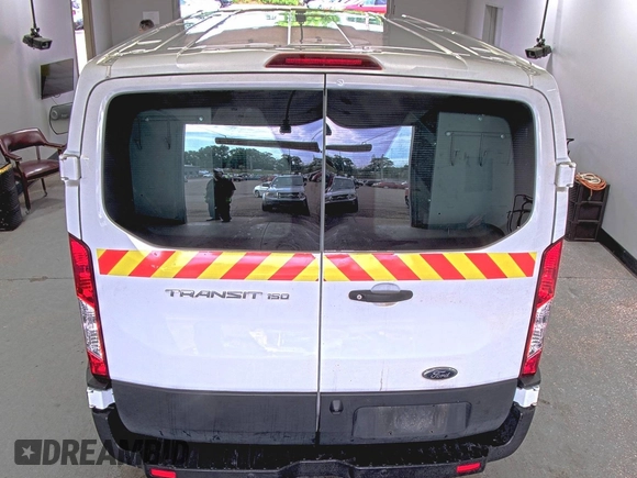 2019 Ford Transit with VIN 1FTYE1YM0KKB31938, listed as a IAAI auction lot 42667322 with 196,239 mi miles and . Bid and sale history available at DreamBid. Image 8.