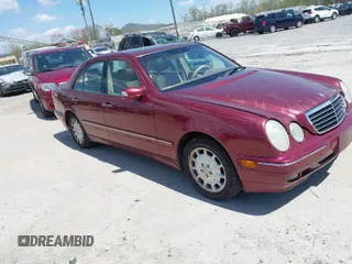 2000 Mercedes-Benz E-Class with VIN WDBJF65J1YB018240, listed as a IAAI auction lot 42051187 with 186,651 mi miles. Bid and sale history available at carsss.com. Image 1.