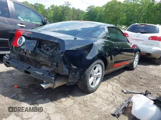 2011 Ford Mustang V6 with VIN 1ZVBP8AM5B5143338, listed as a IAAI auction lot 42161117 with 143,635 mi miles and . Bid and sale history available at DreamBid. Image 4.