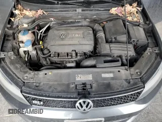 2014 Volkswagen Jetta GLI z VIN 3VW4T7AJ6EM398115, wystawiony jako Copart lot #89179925 z przebiegiem 81 264 mil mil oraz Szkoda całkowita • Salvage title. Historia ofert i sprzedaży dostępna na DreamBid. Obrazek 12.