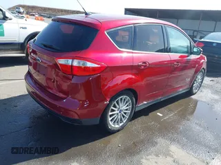 2013 Ford C-Max SEL z VIN 1FADP5CU4DL555035, wystawiony jako IAAI lot #42355498 z przebiegiem 172 374 mil mil oraz . Historia ofert i sprzedaży dostępna na DreamBid. Obrazek 4.