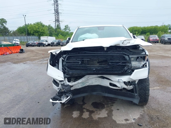 2020 Ram 1500 Big Horn with VIN 1C6SRFFT0LN105011, listed as a IAAI auction lot 42512812 with 71,825 mi miles and . Bid and sale history available at DreamBid. Image 12.
