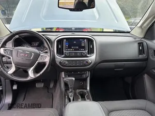 2020 GMC Canyon 2WD SLE with VIN 1GTG5CEN1L1248228, listed as a Copart auction lot 89388675 with 31,980 mi miles and Salvage Title. Bid and sale history available at carsss.com. Image 9.