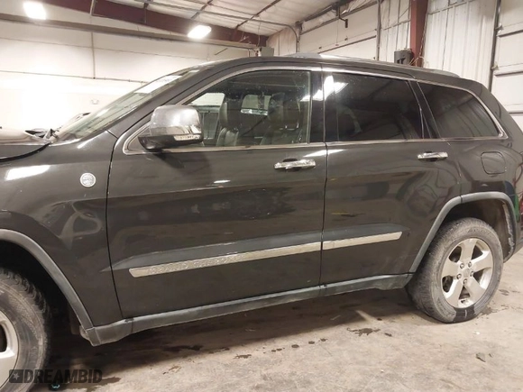 2011 Jeep Grand Cherokee Limited with VIN 1J4RR5GG3BC651065, listed as a IAAI auction lot 41020593 with 154,825 mi miles. Bid and sale history available at carsss.com. Image 14.