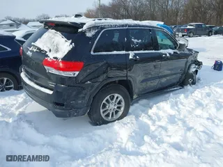 2018 Jeep Grand Cherokee Laredo E with VIN 1C4RJFAG1JC200226, listed as a IAAI auction lot 41277915 with 64,031 mi miles. Bid and sale history available at carsss.com. Image 4.