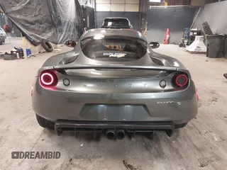 2013 Lotus Evora z VIN SCCLMDSU7DHA10025, wystawiony jako IAAI lot #41298776 z przebiegiem 18 194 mil mil oraz . Historia ofert i sprzedaży dostępna na DreamBid. Obrazek 16.