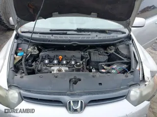 2008 Honda Civic Cpe EX-L with VIN 2HGFG12938H546744, listed as a IAAI auction lot 41526059 with 232,981 mi miles. Bid and sale history available at carsss.com. Image 10.