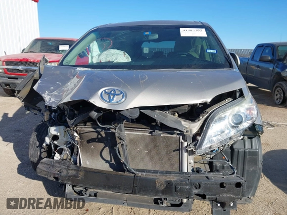 2015 Toyota Sienna XLE with VIN 5TDYK3DC8FS547056, listed as a IAAI auction lot 41387793 with 140,767 mi miles and . Bid and sale history available at DreamBid. Image 13.
