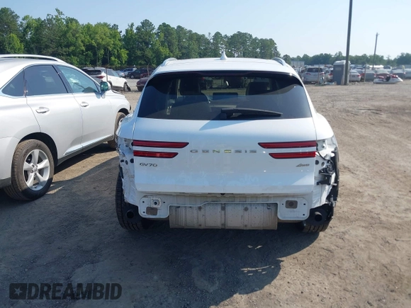 2023 Genesis GV70 2.5T with VIN KMUMADTB6PU096929, listed as a IAAI auction lot 42554427 with 73,553 mi miles and . Bid and sale history available at DreamBid. Image 16.