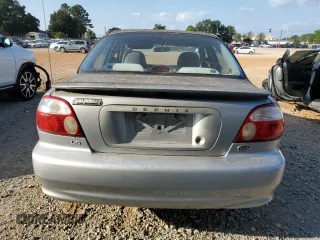 2001 Kia Sephia z VIN KNAFB121715014673, wystawiony jako Copart lot #71712174 z przebiegiem 83 277 mil mil oraz Szkody całkowita. Historia ofert i sprzedaży dostępna na DreamBid. Obrazek 6.