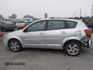 2003 Pontiac Vibe with VIN 5Y2SL62833Z438839, listed as a IAAI auction lot 41977690 with 234,670 mi miles. Bid and sale history available at carsss.com. Image 12.