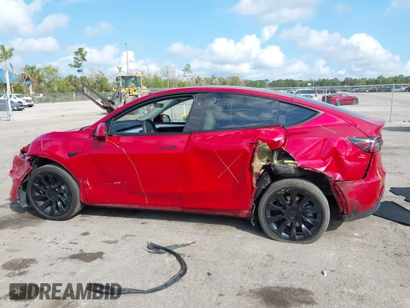 2023 Tesla Model Y Long Range with VIN 7SAYGDEE1PA154996, listed as a IAAI auction lot 41472595 with 24,861 mi miles and . Bid and sale history available at DreamBid. Image 14.