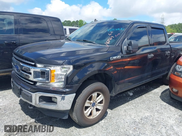 2019 Ford F-150 XL with VIN 1FTEW1E56KFA63764, listed as a IAAI auction lot 42410872 with 124,648 mi miles and . Bid and sale history available at DreamBid. Image 2.