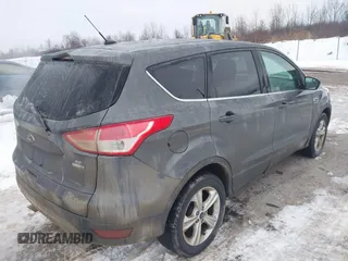 2015 Ford Escape SE with VIN 1FMCU9G90FUB35065, listed as a IAAI auction lot 41165956 with 131,485 mi miles. Bid and sale history available at carsss.com. Image 4.