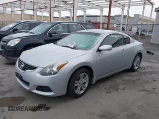 2013 Nissan Altima S with VIN 1N4AL2EPXDC164394, listed as a IAAI auction lot 41894484 with 139,195 mi miles and . Bid and sale history available at DreamBid. Image 2.