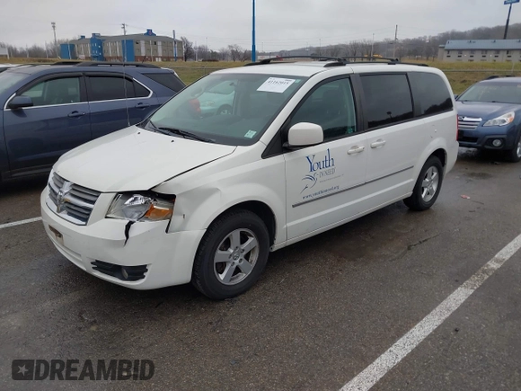 2010 Dodge Grand Caravan SXT with VIN 2D4RN5D1XAR191011, listed as a IAAI auction lot 41162015 with 83,251 mi miles and . Bid and sale history available at DreamBid. Image 2.
