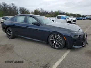 2024 BMW 7 Series 740i xDrive with VIN WBA33EH09RCR24113, listed as a Copart auction lot 56699365 with Not provided miles and Salvage title. Bid and sale history available at DreamBid. Image 4.