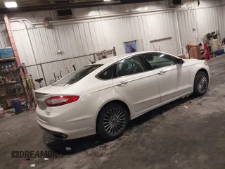 2013 Ford Fusion Titanium with VIN 3FA6P0K96DR123542, listed as a IAAI auction lot 41630275 with 140,698 mi miles. Bid and sale history available at carsss.com. Image 4.