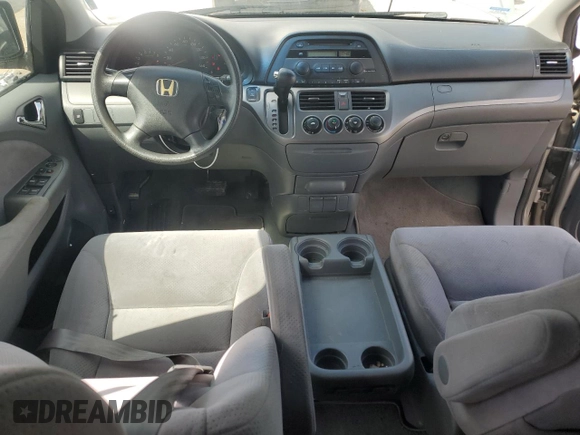 2007 Honda Odyssey LX z VIN 5FNRL382X7B084104, wystawiony jako Copart lot #57399625 z przebiegiem 213 134 mil mil oraz Szkoda całkowita • Salvage title. Historia ofert i sprzedaży dostępna na DreamBid. Obrazek 8.