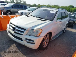 2011 Mercedes-Benz GL-Class GL 450 with VIN 4JGBF7BE1BA709277, listed as a IAAI auction lot 42163011 with 140,130 mi miles. Bid and sale history available at carsss.com. Image 2.