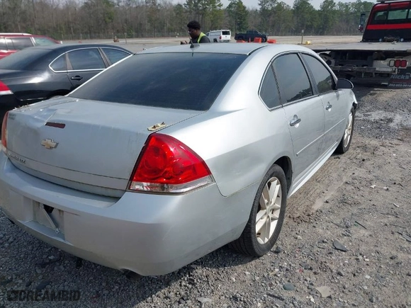 2013 Chevrolet Impala LTZ with VIN 2G1WC5E33D1200858, listed as a IAAI auction lot 41784028 with 191,138 mi miles. Bid and sale history available at carsss.com. Image 4.
